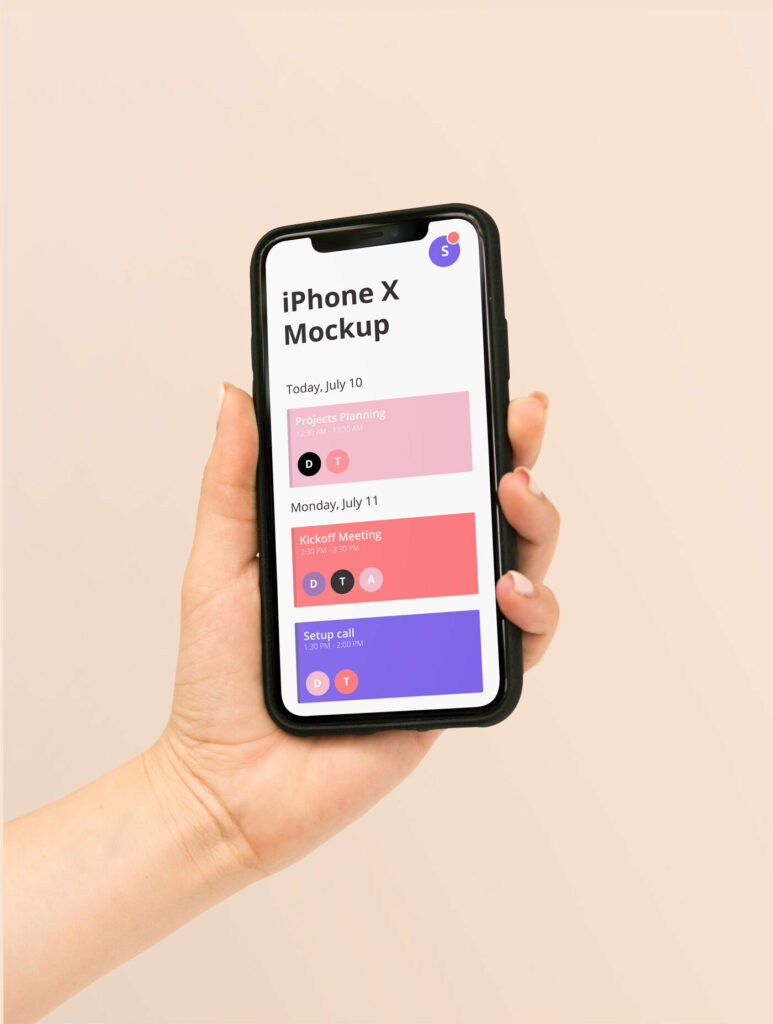 iPhone X in a Woman’s Hand Mockup