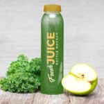 Juice Bottle Mockup Including Lettuce and Apple Half