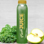 Juice Bottle Mockup Including Lettuce and Apple Half
