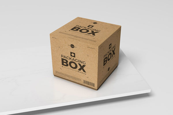 Kraft Packaging Box Placed on a Slab of Stone Mockup