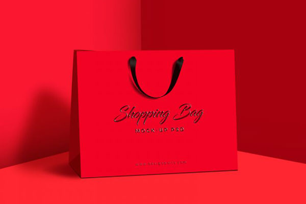 Large Paper Shopping Bag in the Corner of the Wall Mockup