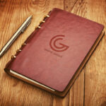 Leather Notebook Cover with Emboss Logo Mockup on Wooden Surface