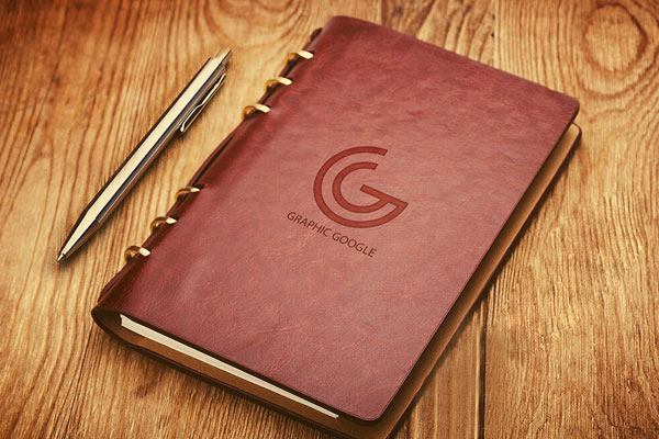 Leather Notebook Cover with Emboss Logo Mockup on Wooden Surface