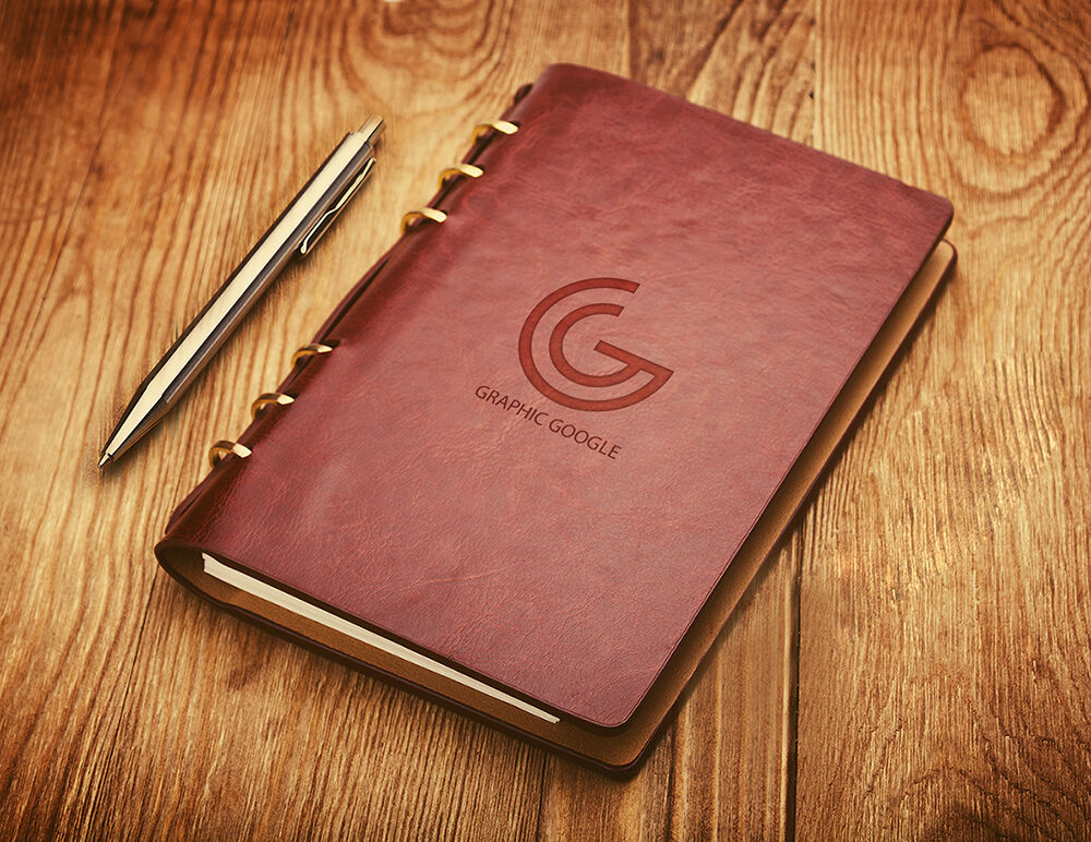 Leather Notebook Cover with Emboss Logo Mockup on Wooden Surface