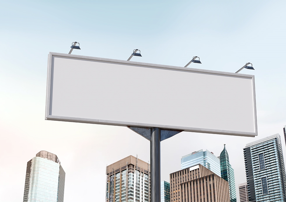 Low-angle Shot Horizontal Billboard Mockup Featuring City Buildings