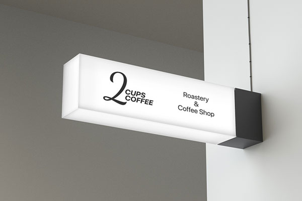 Low-angle Shot of Horizontal Lightbox Signage Set up in Wall Mockup