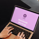 MacBook Air Mockup with Hands in Perspective View