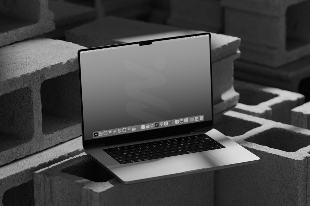 MacBook Pro Mockup on Bricks in Perspective Sight