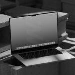 MacBook Pro Mockup on Bricks in Perspective Sight
