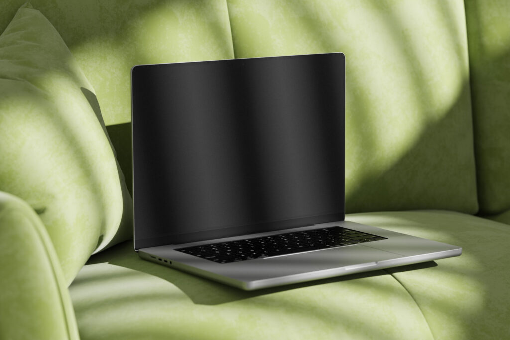 MacBook Pro Mockup on Sofa