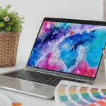 MacBook Pro Mockup Opened on a Desk in Half-Side View