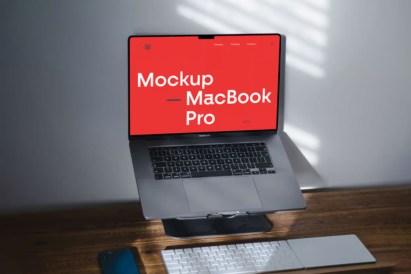 Free MacBook Pro on Stand Mockup PSD Template