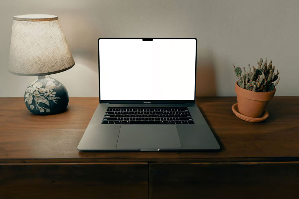 MacBook Pro on the Wooden Dresser Mockup