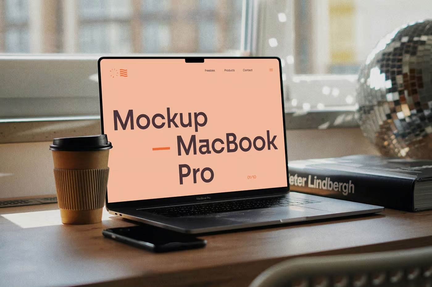 Free MacBook Pro on Writing Desk Mockup PSD Template