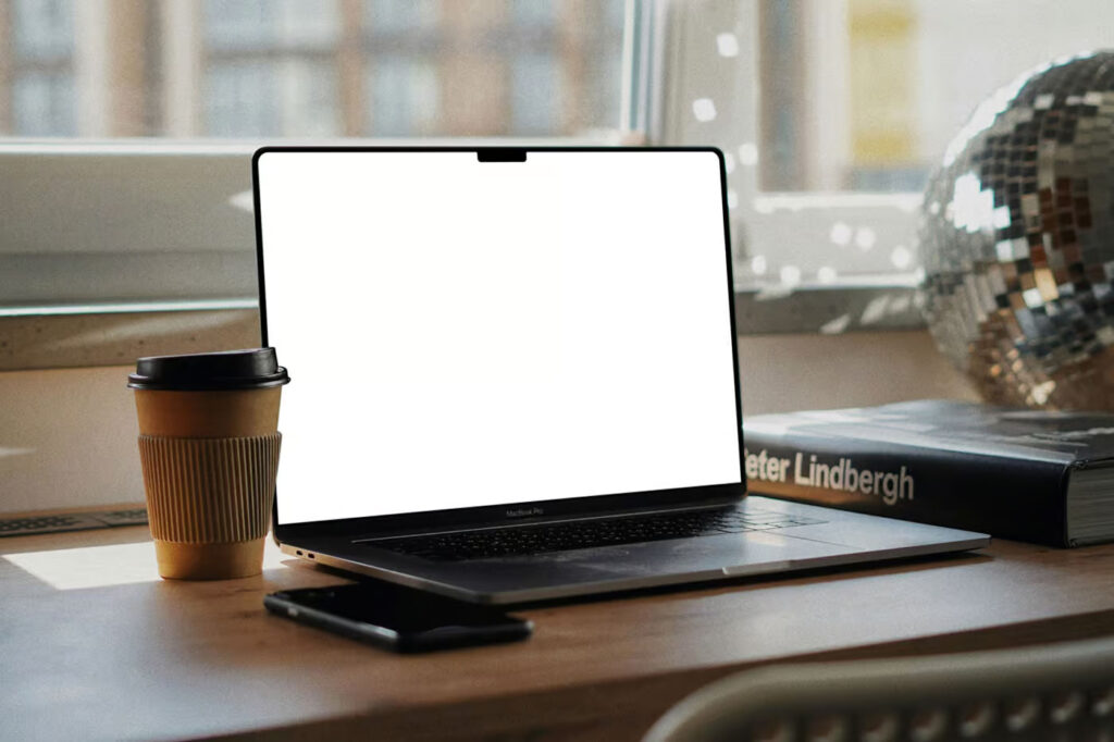 MacBook Pro on Writing Desk Mockup