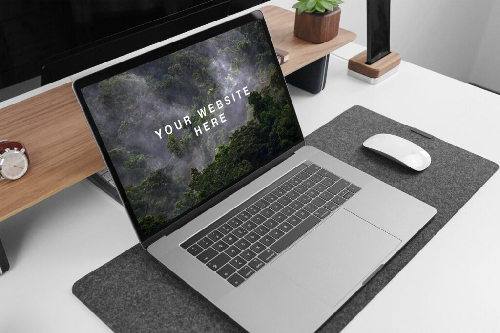 MacBook Pro Side View on Table with Similar Items Mockup