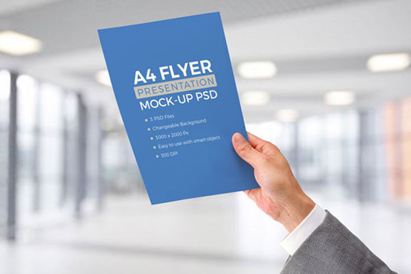 Male Hand Holding A4 Letterhead Paper Mockup