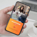 Man Holding a Full-Screen Smartphone Mockup