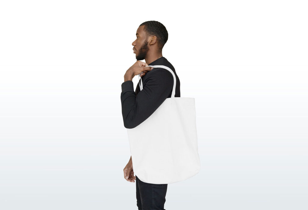 Men Holding Big Canvas Bag Mockup