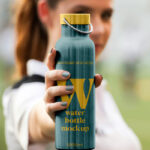 Metal Water Bottle in Hand Mockup