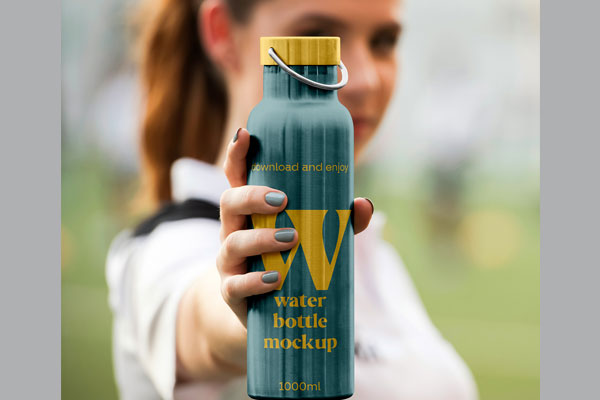 Metal Water Bottle in Hand Mockup