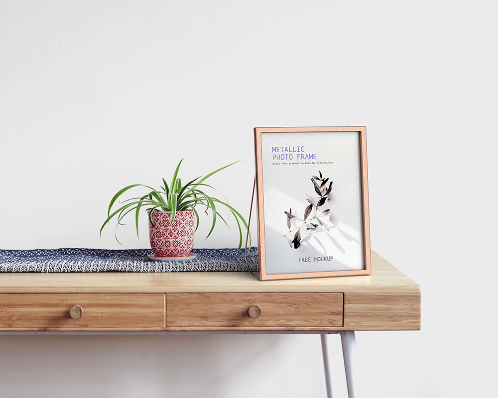 Metallic Photo Frame Mockup on Wooden Table