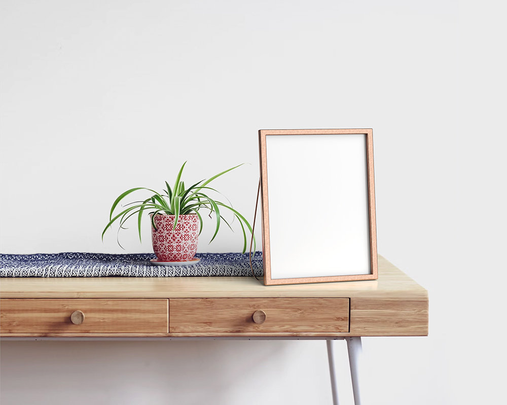 Metallic Photo Frame Mockup on Wooden Table