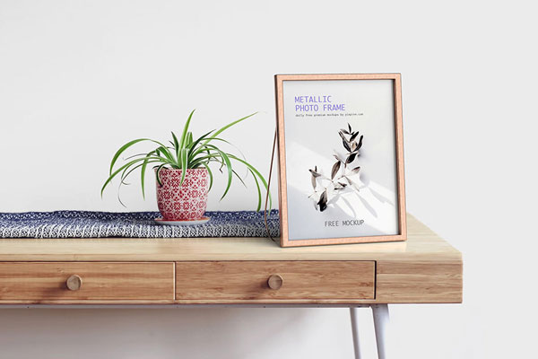 Metallic Photo Frame Mockup on Wooden Table