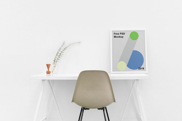 Minimal Mockup Including a Poster Frame on a Table