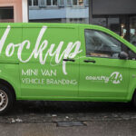 Minivan in City Streets in the Side View Mockup