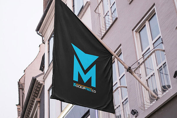 Mockup Featuring Lower Angle View of a Flag Mounted on a Wall
