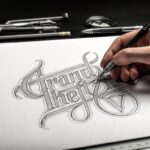 Mockup Displaying a Hand Drawing on a Sketchbook