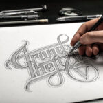 Mockup Displaying a Hand Drawing on a Sketchbook