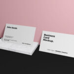 Mockup Featuring 2 Business Cards Relying on Wall