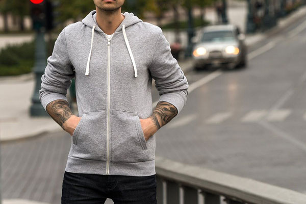 Mockup Featuring a Man Wearing Zip-Up and Simple Hoodies with Laces