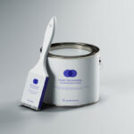 Mockup Featuring a Paint Brush Leaning Against a Paint Can