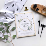 Mockup Featuring a Top View Texture Paper, Glass and Leaf