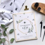 Mockup Featuring a Top View Texture Paper, Glass and Leaf