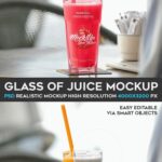 Mockup Featuring Big Glass of Juice on a Table at a Cafe