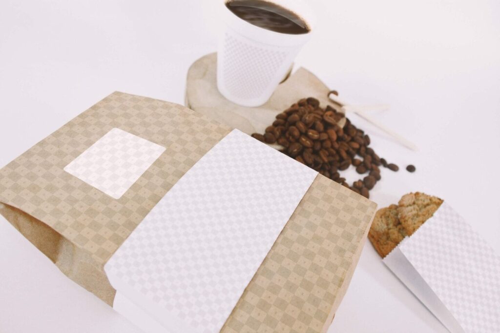 Mockup Featuring Coffee and Cookie Bags and Coffee Cup