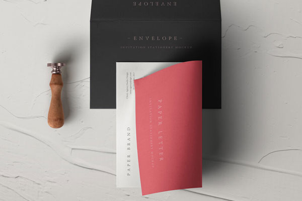 Mockup Featuring Folded Invitation Card on Opened Backward Envelope