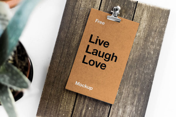 Mockup Featuring Overhead View of Card on Wooden Board