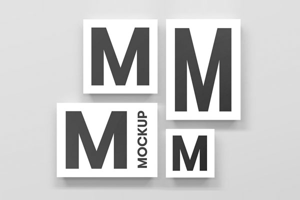 Mockup Featuring Overhead View of Four Sizes M4 Posters