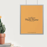 Mockup Featuring Photo Frame Hung on Wall in a Front View