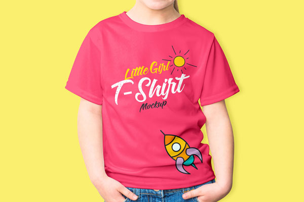 Mockup Featuring Standing Little Girl Wearing T-shirt with Hands in Pocket