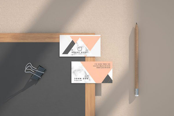 Mockup Featuring Two Business Cards on a Blackboard in Top View