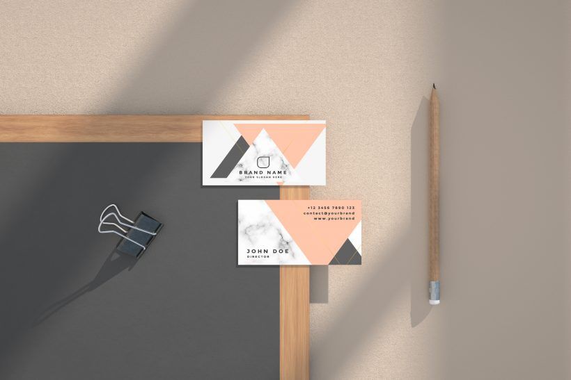 Mockup Featuring Two Business Cards on a Blackboard in Top View