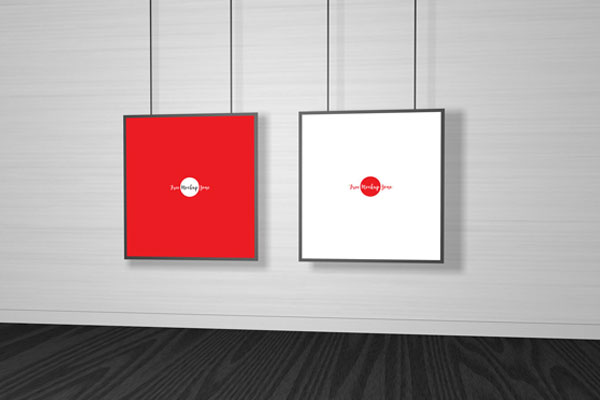 Mockup Featuring Two Gallery Frames Hung From the Ceiling