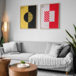 Mockup Featuring Two Posters Hanging Above Couch in Living Room