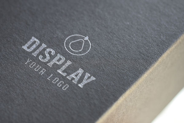 Mockup for a Close Shot of a Logo on a Dark Color Box